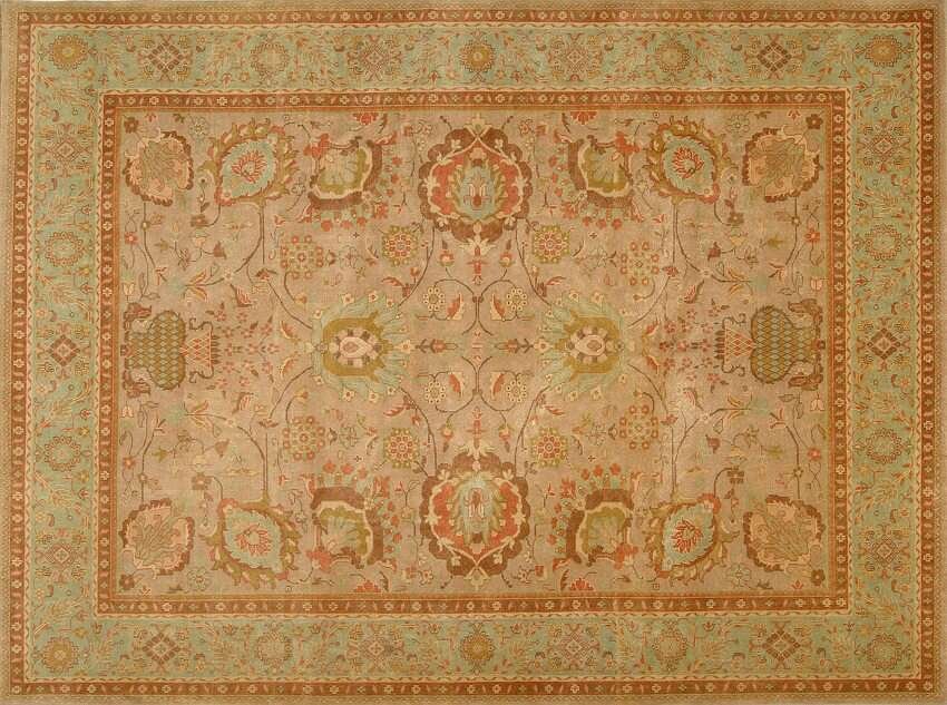 Tapis Ziegler du Pakistan avec grand motif floral sur fond crème, illustrant un design classique et élégant.