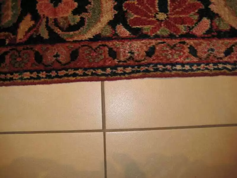 Lisières de tapis réparées