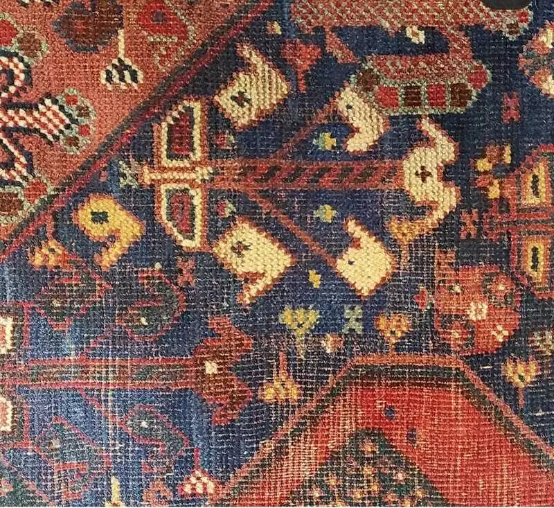  Restauration professionnelle d'un tapis persan ancien lourdement endommagé