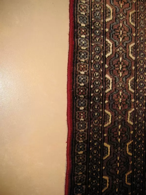 réparation de bords de tapis ( après )