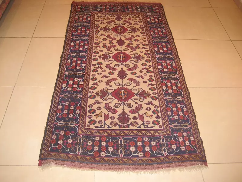 tapis d'orient délavé avant nettoyage spécialisé