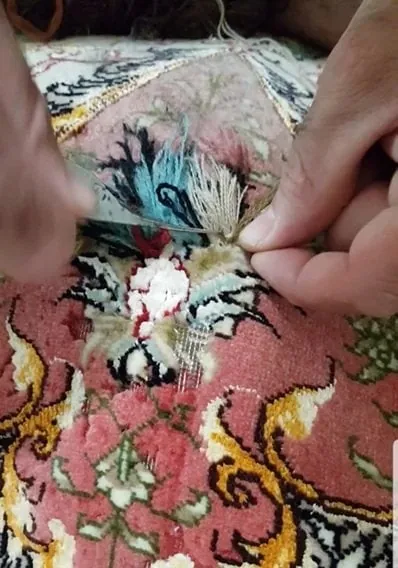 la réparation de tapis Tabriz en laine et soie